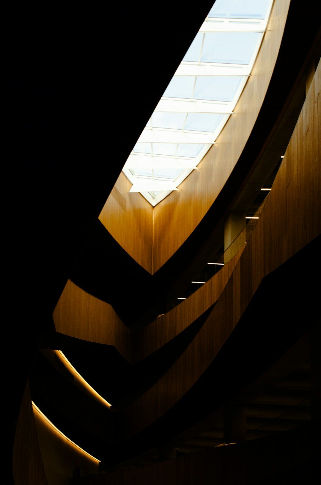 Modern architectural interior with staircase and skylight